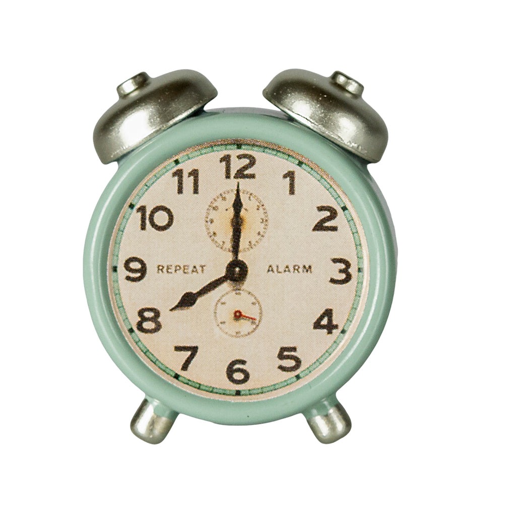 Front view of the Maileg mint green alarm clock for mice, complete with silver bells and a classic design.