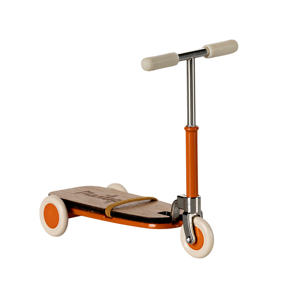 Maileg mouse kickboard scooter in bright orange with cream wheels and handlebars.