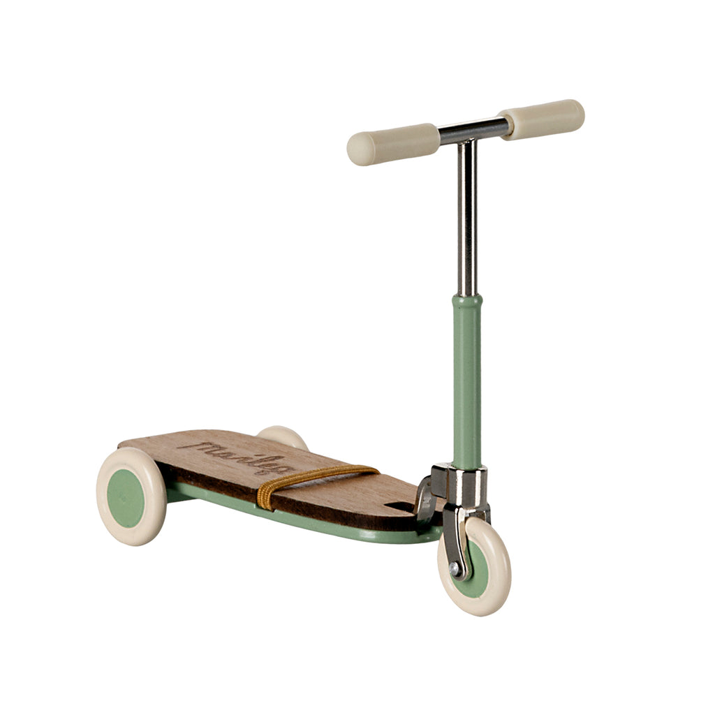 Maileg mouse kickboard scooter in soft mint green with cream wheels and handlebars.