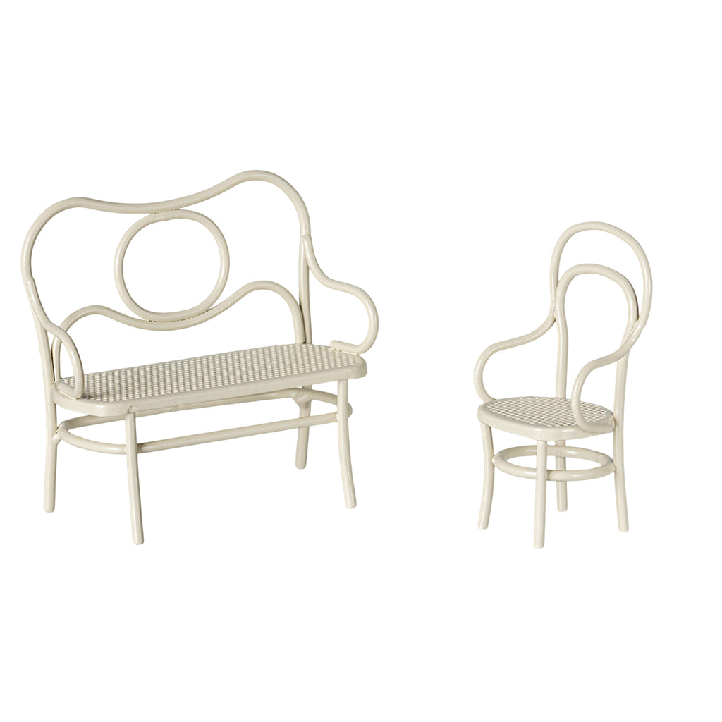 A beautifully designed Maileg miniature bench and chair in off white, perfect for pairing with the café table to create a cosy seating arrangement for Maileg mice.
