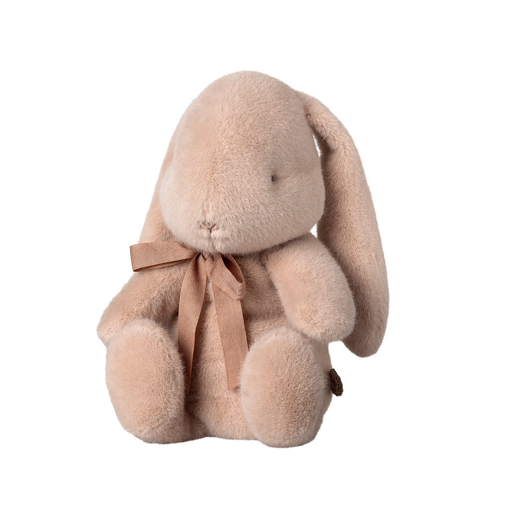 The same Maileg small bunny plush in light powder with a pink bow, shown from a side angle to showcase its adorable and cuddly charm.