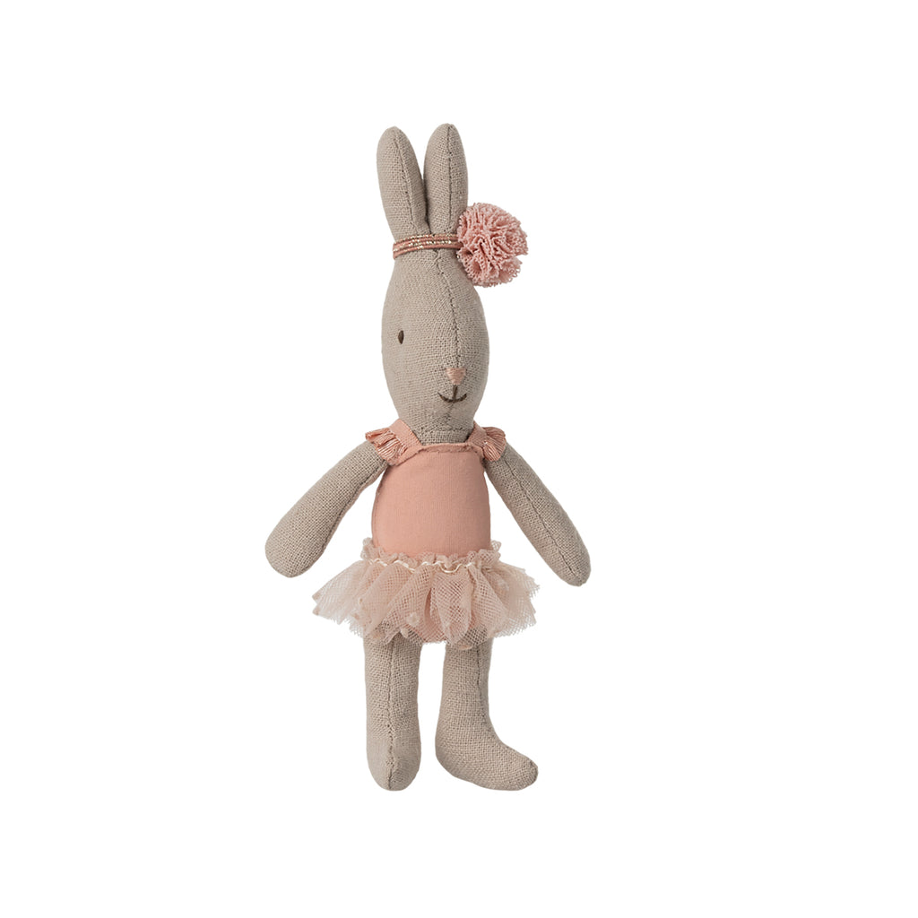 A delightful Maileg micro rabbit dressed in a rose-coloured ballet suit, complete with a floral headband adorning its ears