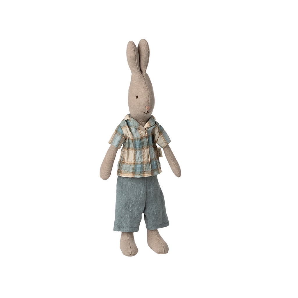 A Maileg rabbit dressed in a checkered shirt and casual blue trousers, ready for a day out.