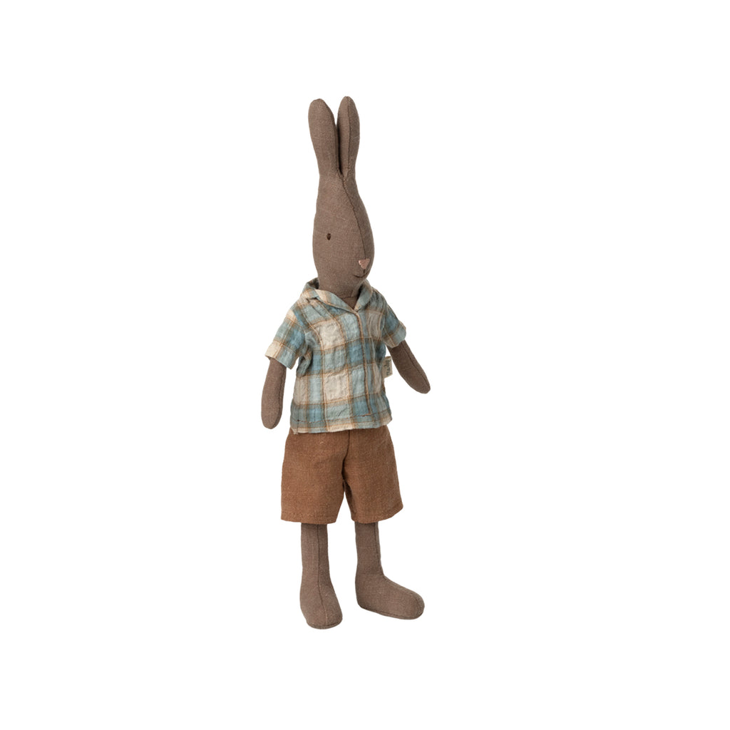 Maileg rabbit size 2 dressed in a brown plaid shirt and brown shorts, standing upright.