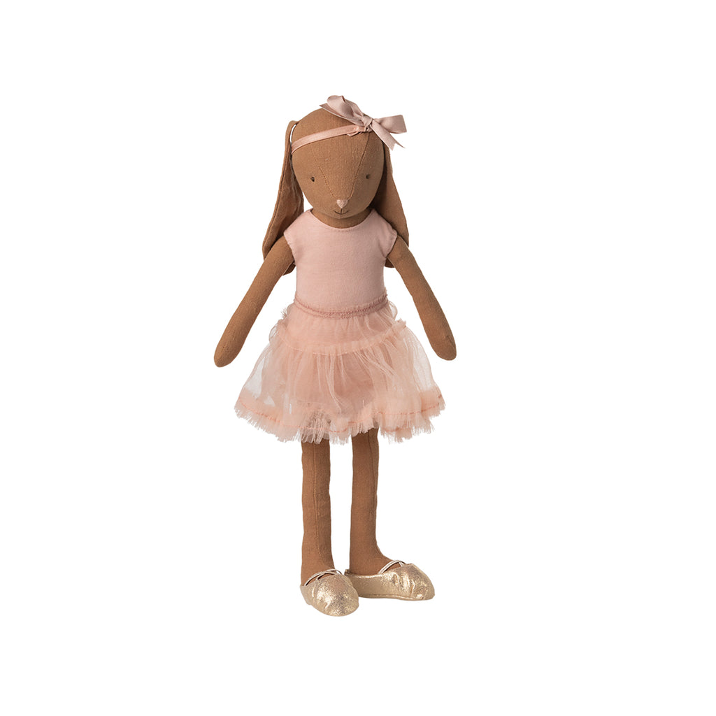 Maileg Bunny size 3 in chocolate brown, dressed in a rose-coloured ballet suit with a matching tulle skirt, sitting with golden ballet slippers.