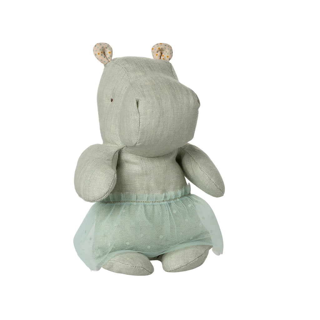 Sitting view of the Maileg Safari Friends hippo plush in mint green, showcasing its playful skirt