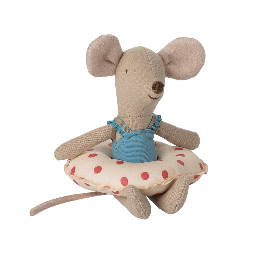 Maileg beach mouse in a blue swimsuit sitting on a red polka-dot float