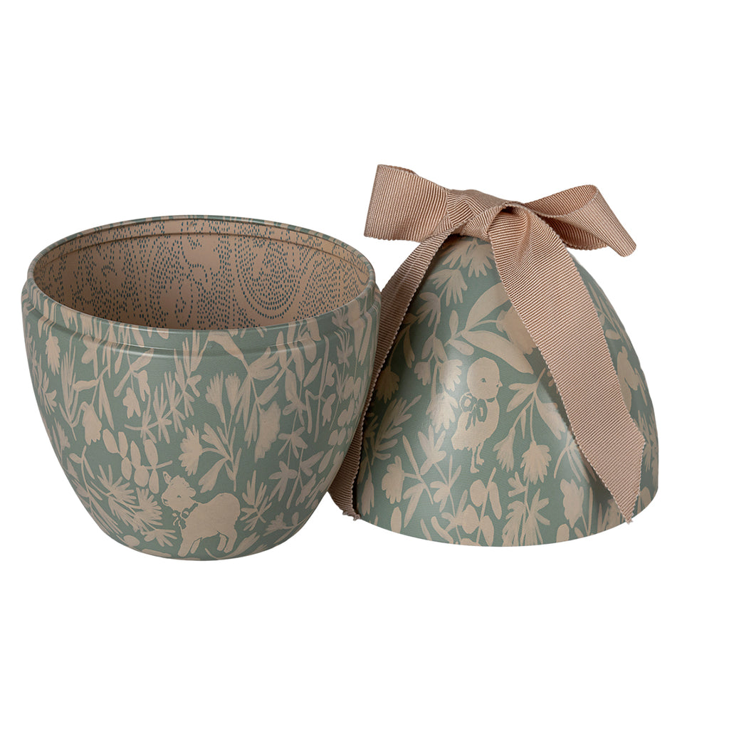 Image 8: "Maileg Easter egg in mint green with detailed floral patterns and a tied ribbon bow.