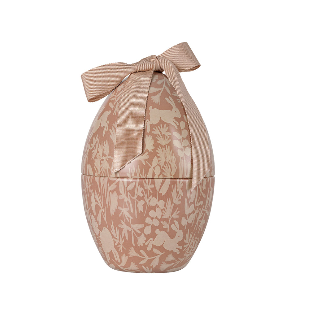 Maileg Easter egg in powder pink with intricate floral patterns, tied with a matching ribbon.