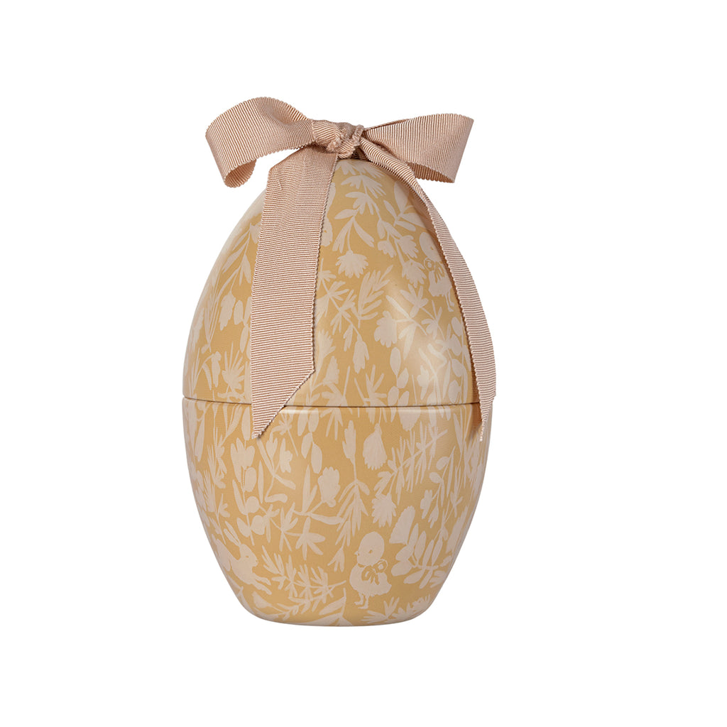 Maileg Easter egg in cream yellow with delicate floral designs, tied with a soft ribbon