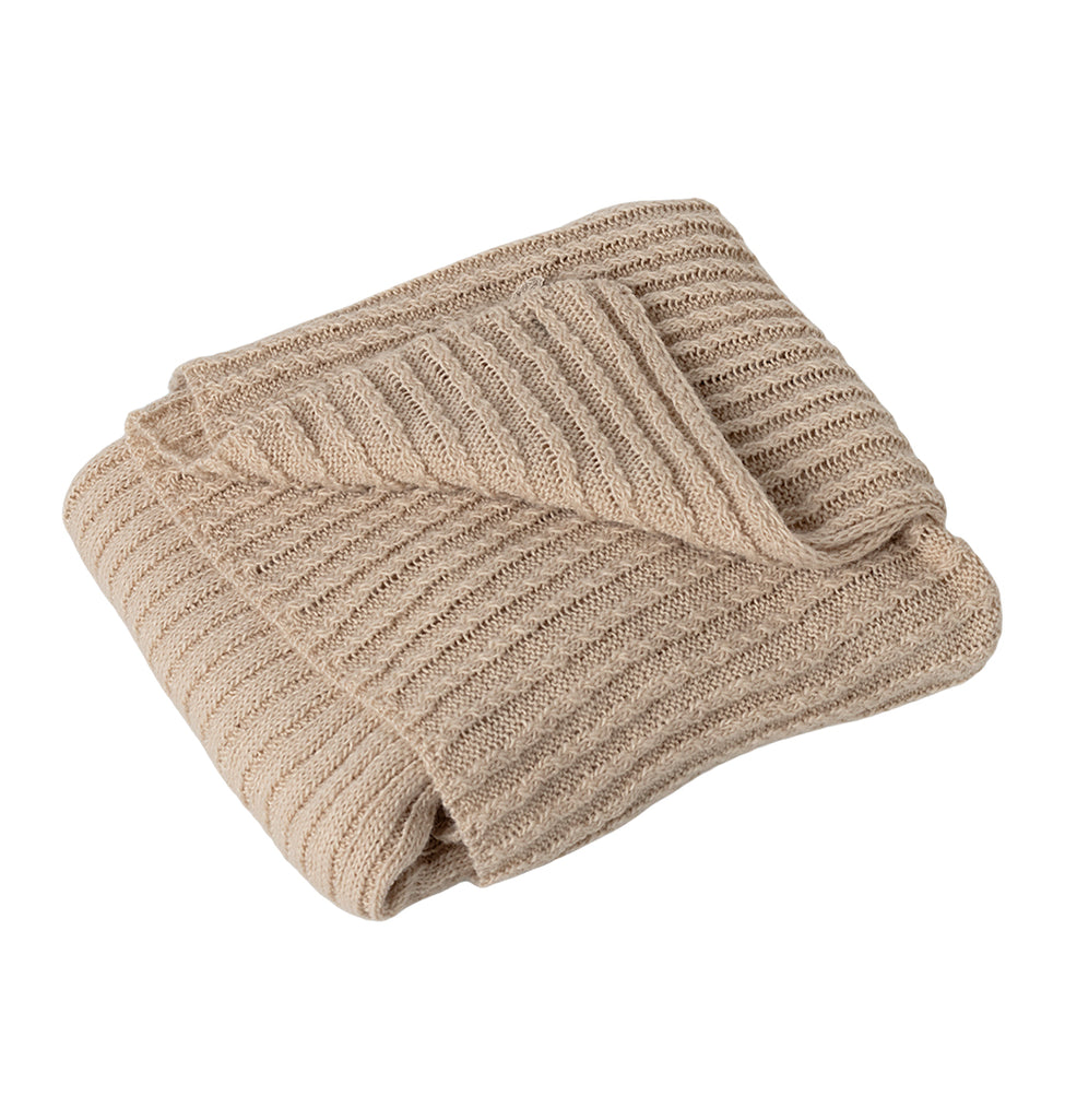 Folded Maileg baby blanket in beige with a ribbed knit design