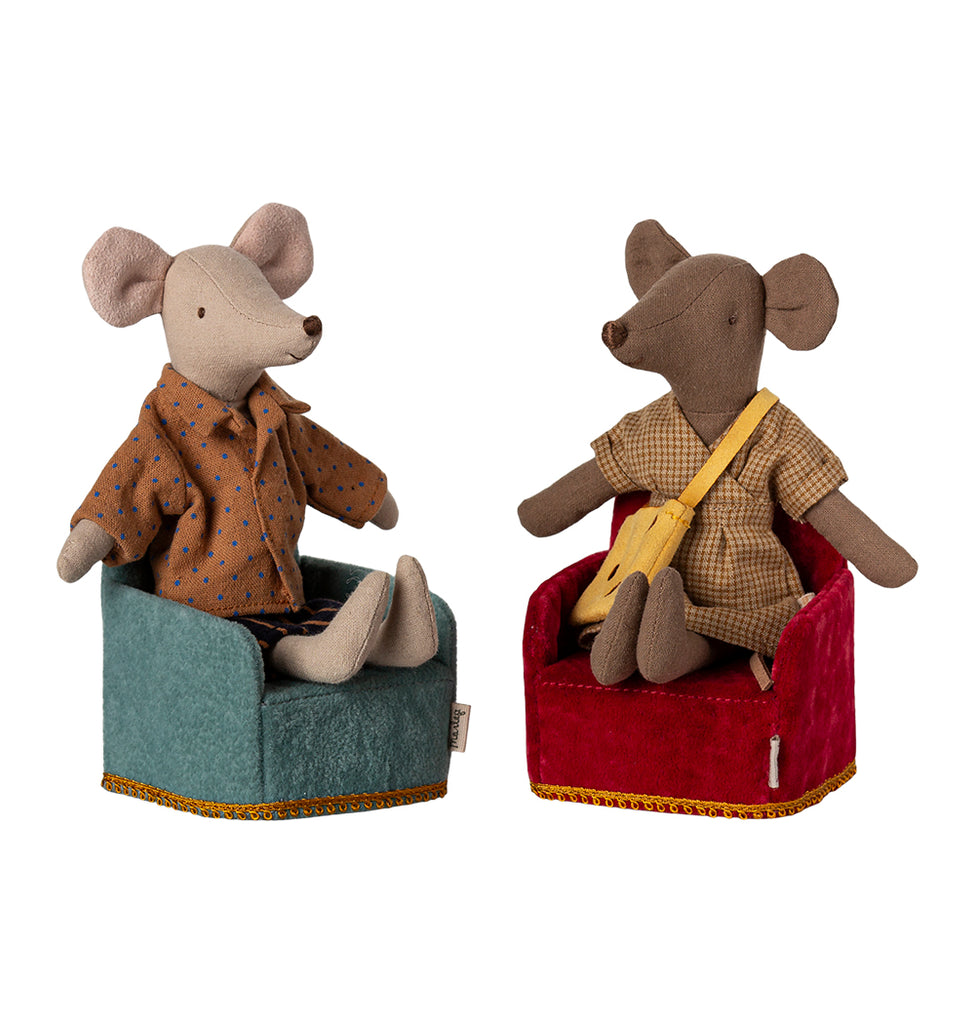 Maileg Mum and Dad Mice sitting in foldable chairs, one in mint and the other in a different colour
