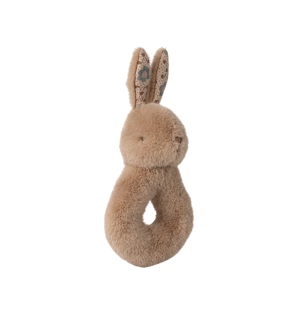 Close-up of the cream peach Maileg rabbit rattle with soft cotton texture