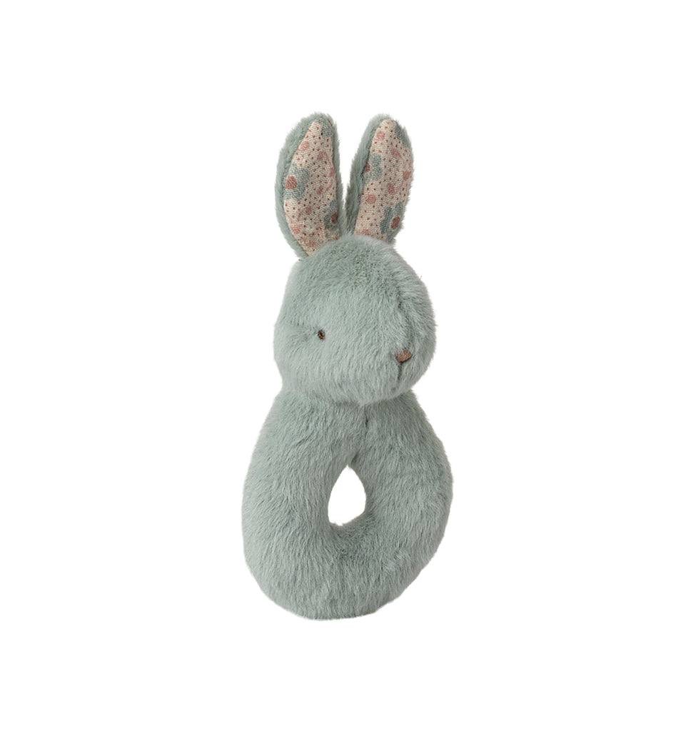 Close-up of the mint Maileg rabbit rattle with soft cotton texture