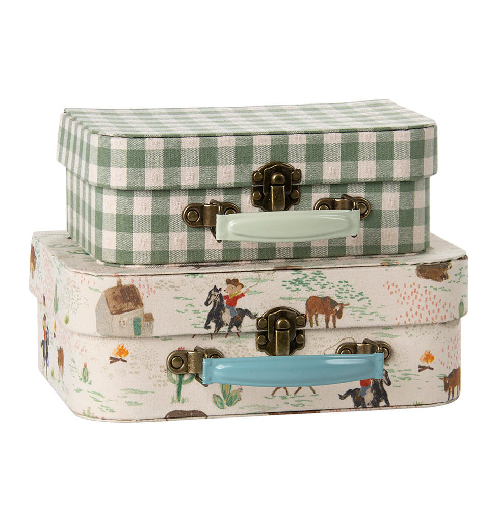 Stacked Maileg suitcase set in pony and gingham prints, charming and practical UK accessory."